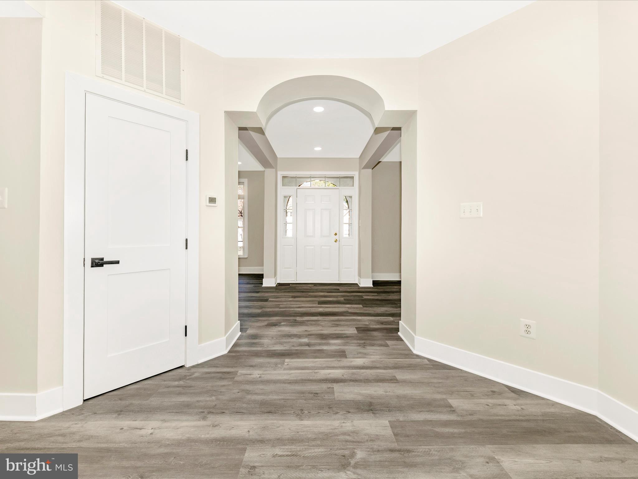 2621 Bear Den Road Frederick, MD 21701 - Photo 12 of 77 a view of a hallway with wooden floor