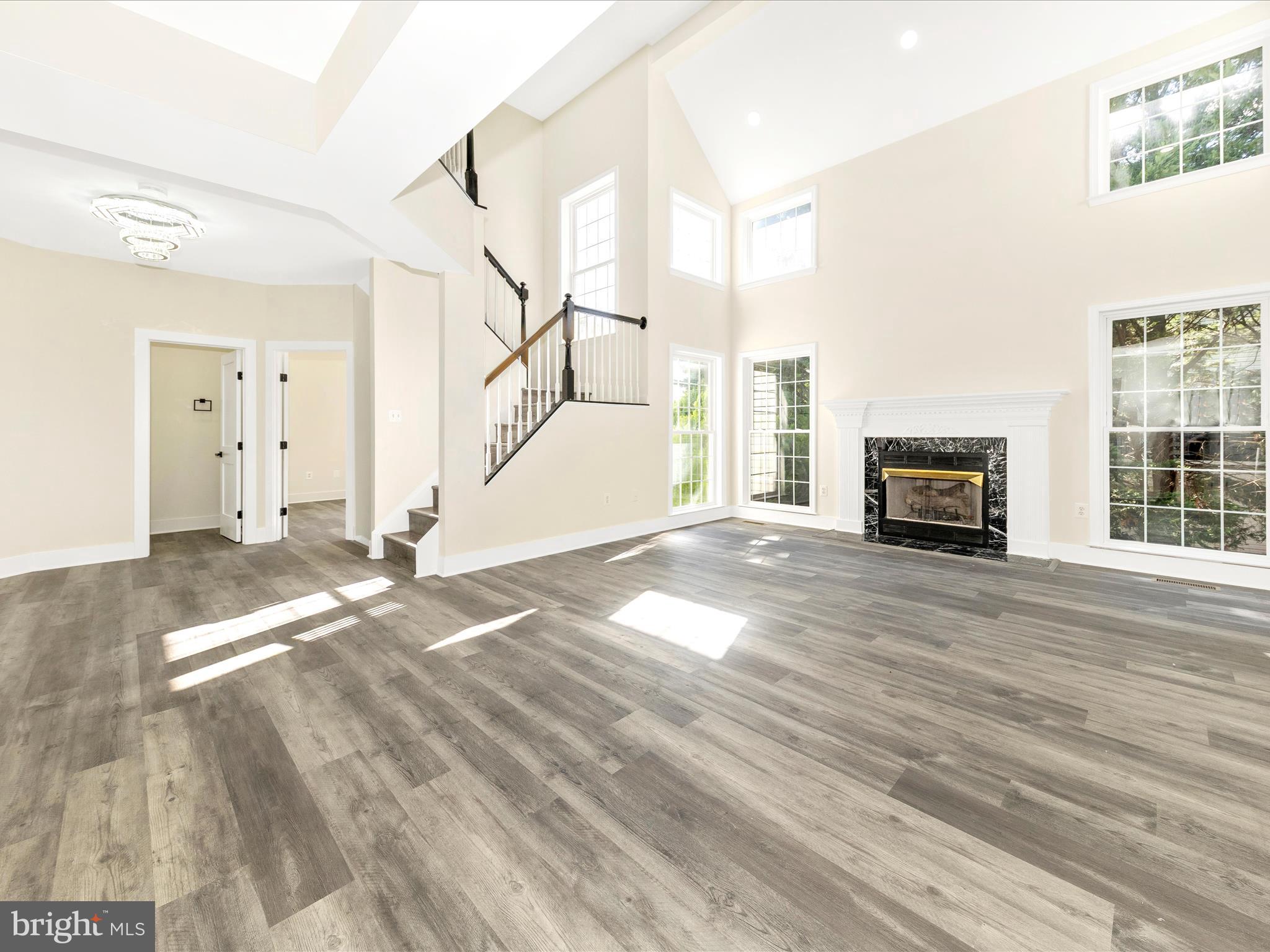 2621 Bear Den Road Frederick, MD 21701 - Photo 18 of 77 a view of a livingroom with wooden floor and furniture