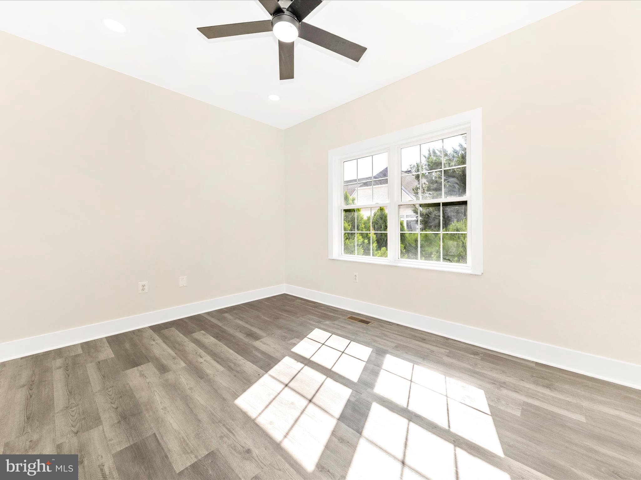 2621 Bear Den Road Frederick, MD 21701 - Photo 27 of 77 an empty room with windows