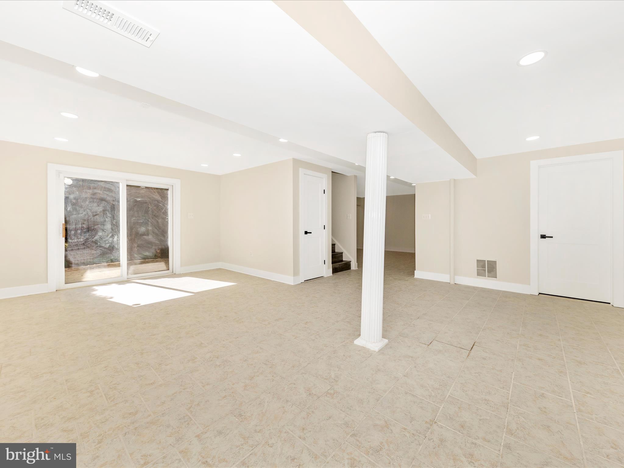 2621 Bear Den Road Frederick, MD 21701 - Photo 41 of 77 a view of empty room with a fireplace