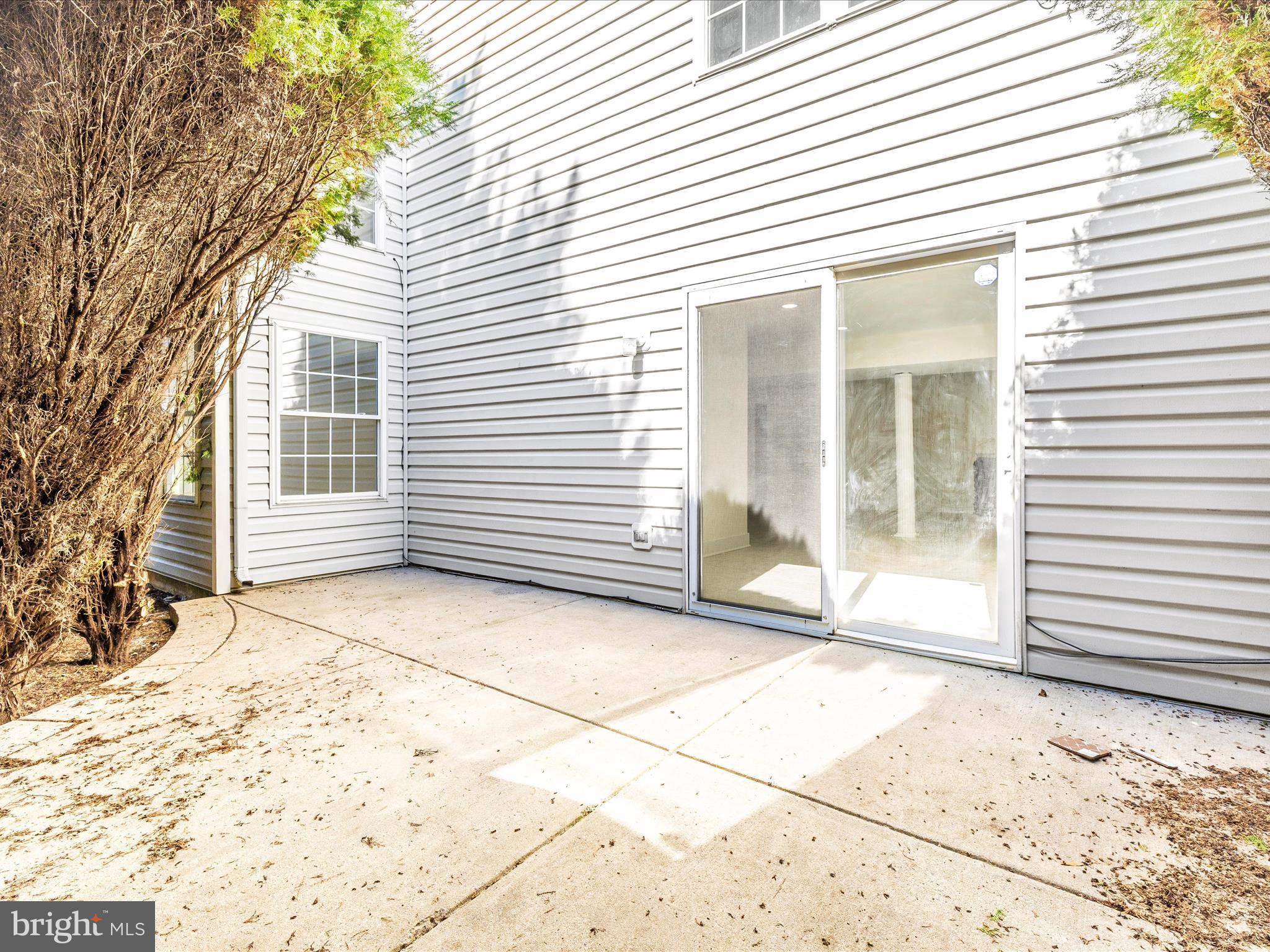 2621 Bear Den Road Frederick, MD 21701 - Photo 56 of 77 a view of a white house with a large window