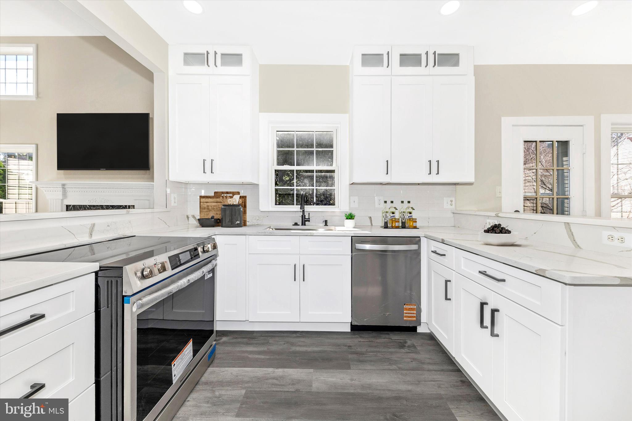 2621 Bear Den Road Frederick, MD 21701 - Photo 9 of 77 a kitchen with a sink stove and microwave