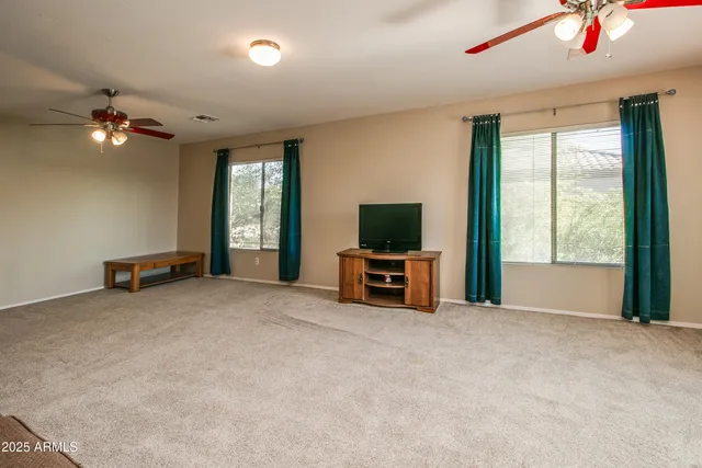 a bathroom with a shower and a glass door