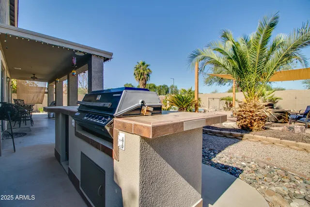 a view of a swimming pool with a yard