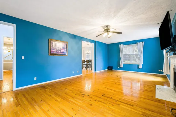 a view of a dining room with furniture and window