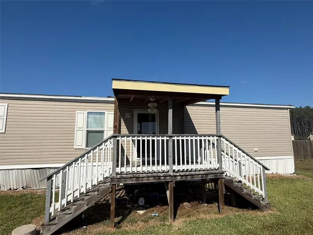 a view of outdoor space with trees all around