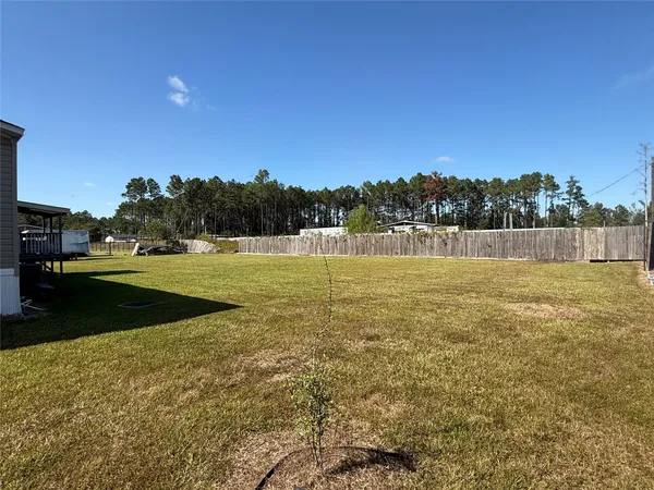 a view of swimming pool with chairs