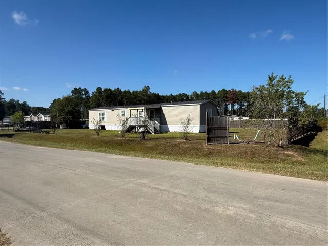 a view of balcony with wooden floor