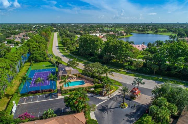 141 St Michaels Court Jupiter, FL 33458 - Photo 37 of 37 Aerial View of Pool and Tennis Courts