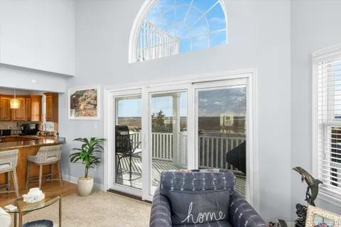 a view of balcony with furniture
