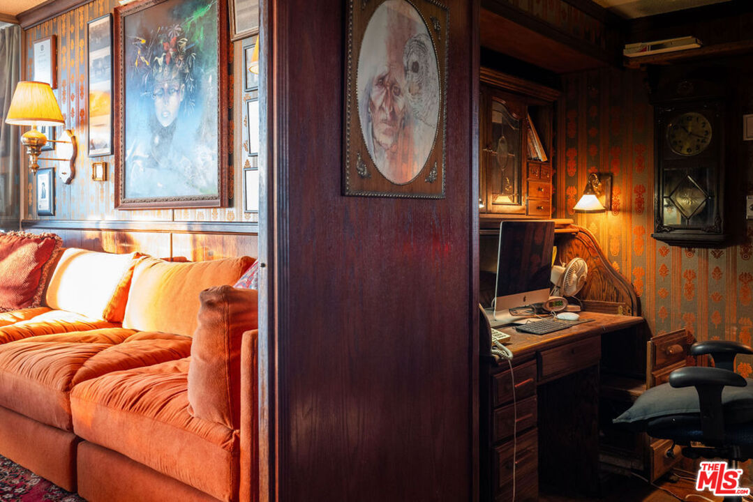 8787 Shoreham Drive, Unit 607 West Hollywood, CA 90069 - Photo 13 of 25 a view of walk in closet with clothes and shoes