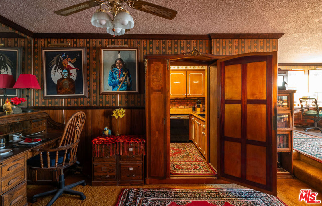 8787 Shoreham Drive, Unit 607 West Hollywood, CA 90069 - Photo 7 of 25 a view of a hallway with wooden floor and windows