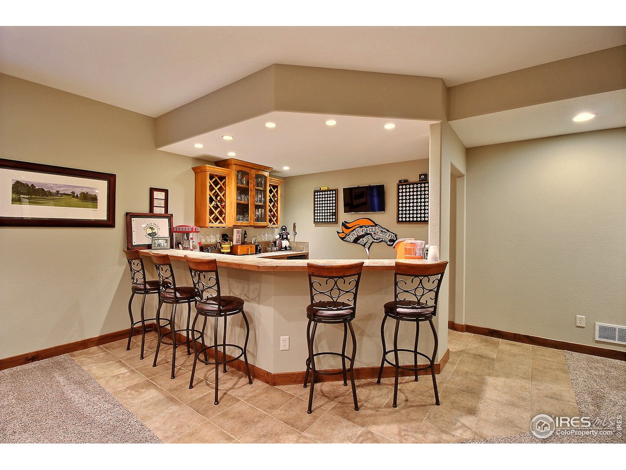 7408 Poudre River Road Greeley, CO 80634 - Photo 25 of 39 Amazing Wet Bar w/ Dishwasher & Fridge