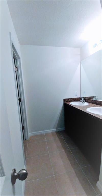 3936 Bramblewood Loop Spring Hill, FL 34609 - Photo 14 of 30 a room with a door