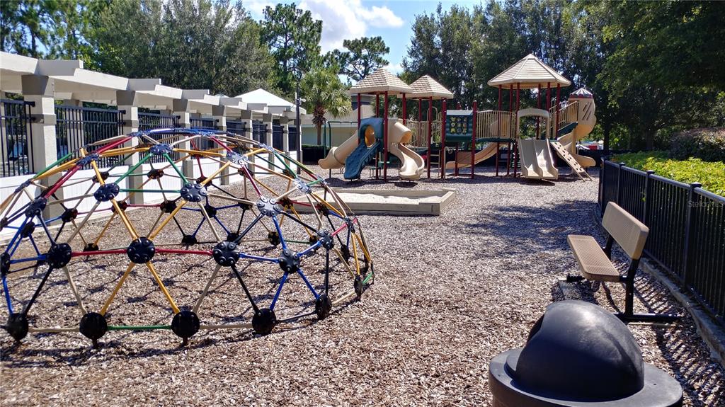 3936 Bramblewood Loop Spring Hill, FL 34609 - Photo 23 of 30 a view of a chairs and tables in a patio