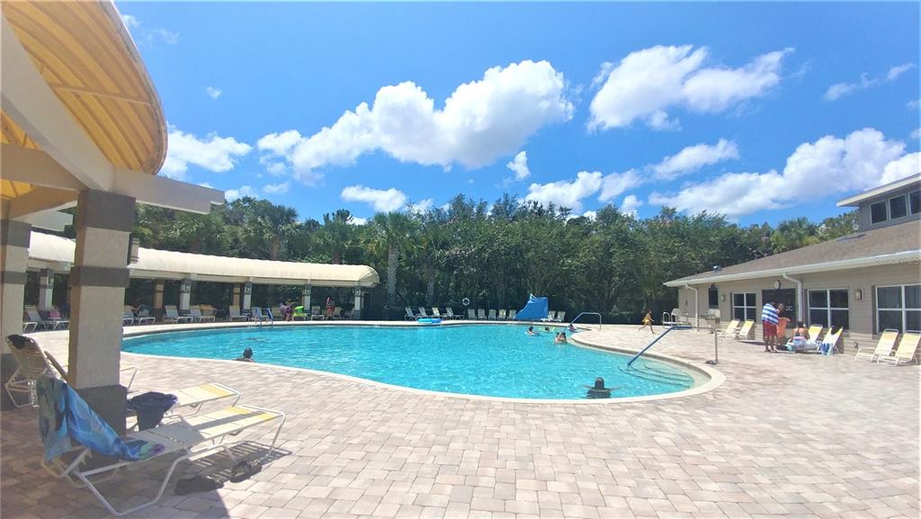 3936 Bramblewood Loop Spring Hill, FL 34609 - Photo 26 of 30 a view of a house with a swimming pool