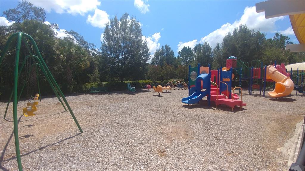 3936 Bramblewood Loop Spring Hill, FL 34609 - Photo 29 of 30 a view of outdoor space with trampoline