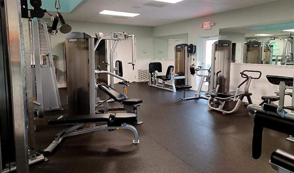 3936 Bramblewood Loop Spring Hill, FL 34609 - Photo 30 of 30 a view of a room with gym equipment