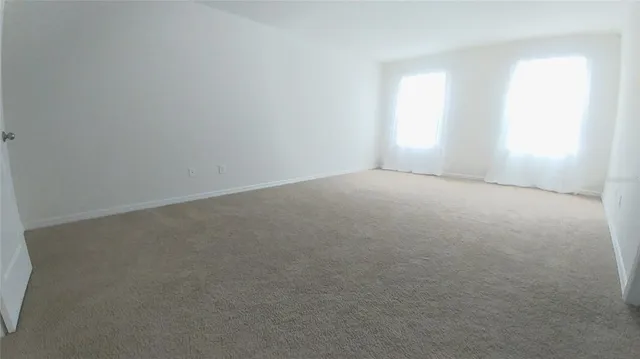 a view of hallway with stairs