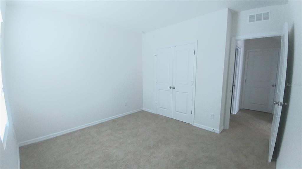 3936 Bramblewood Loop Spring Hill, FL 34609 - Photo 9 of 30 a view of an empty room