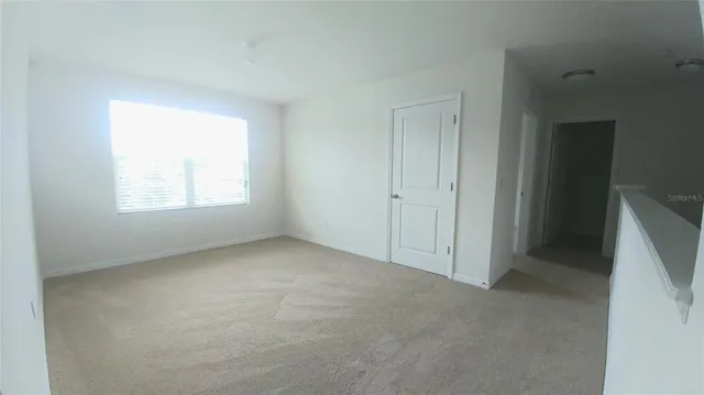 an empty room with a window