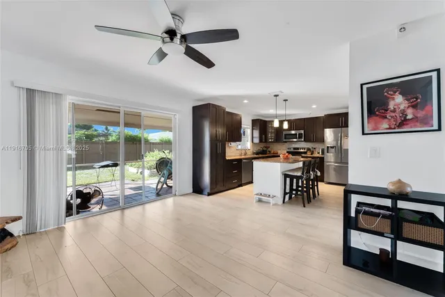 a lobby with furniture and a floor to ceiling window