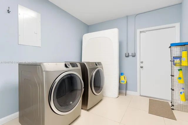 a view of hallway with washer and dryer