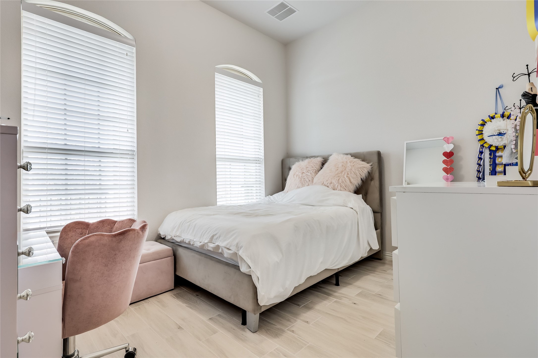 7705 Pace Ravine Drive Lago Vista, TX 78645 - Photo 20 of 40 Secondary bedroom 1 featuring light wood-type flooring