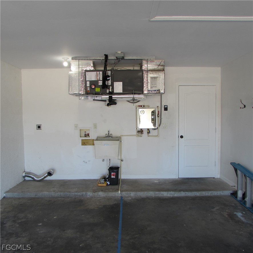 5773 Marina Road Bokeelia, FL 33922 - Photo 26 of 27 a view of a storage & utility room