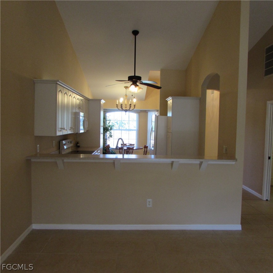 5773 Marina Road Bokeelia, FL 33922 - Photo 10 of 27 a view of a living room with windows