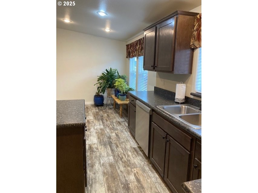 3075 Southwest River View Drive Pendleton, OR 97801 - Photo 11 of 34 a kitchen with sink and cabinets