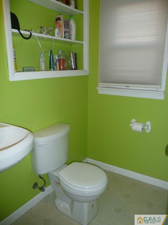 159 East Hill Road Colonia, NJ 07067 - Photo 14 of 21 a bathroom with a toilet and a sink