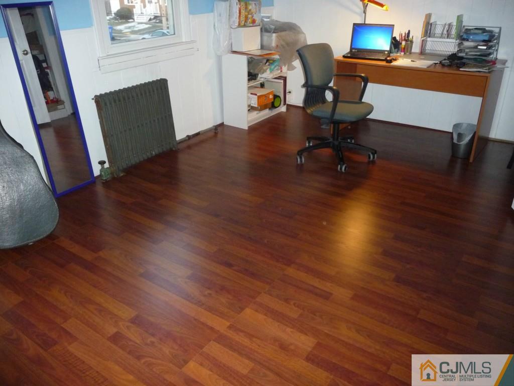 159 East Hill Road Colonia, NJ 07067 - Photo 16 of 21 a workspace with furniture window and wooden floor
