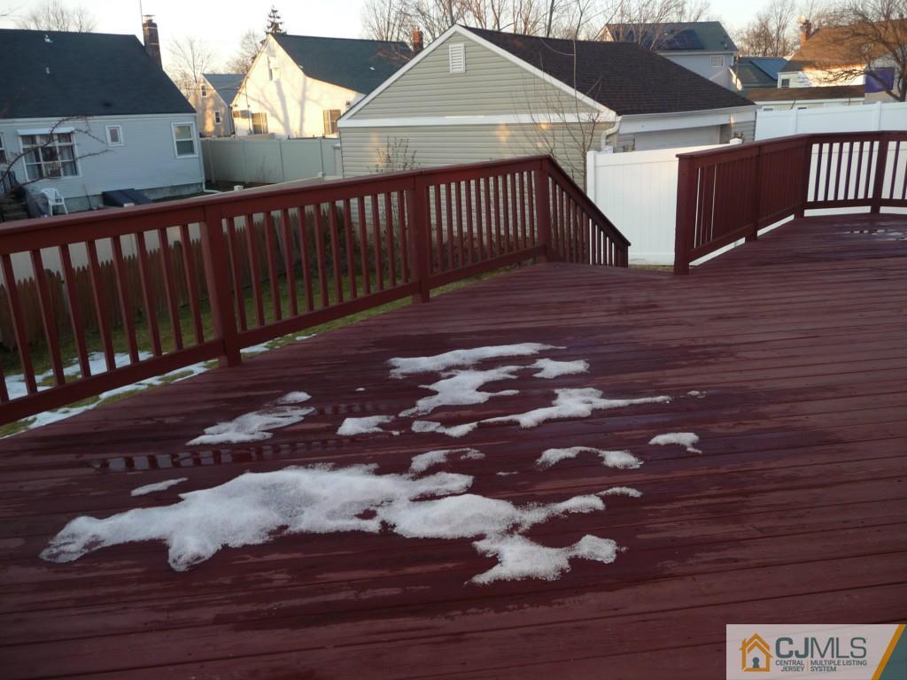 159 East Hill Road Colonia, NJ 07067 - Photo 21 of 21 a view of a brick house with wooden floor