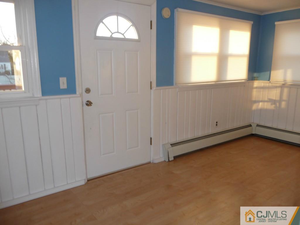 159 East Hill Road Colonia, NJ 07067 - Photo 4 of 21 an empty room with a window