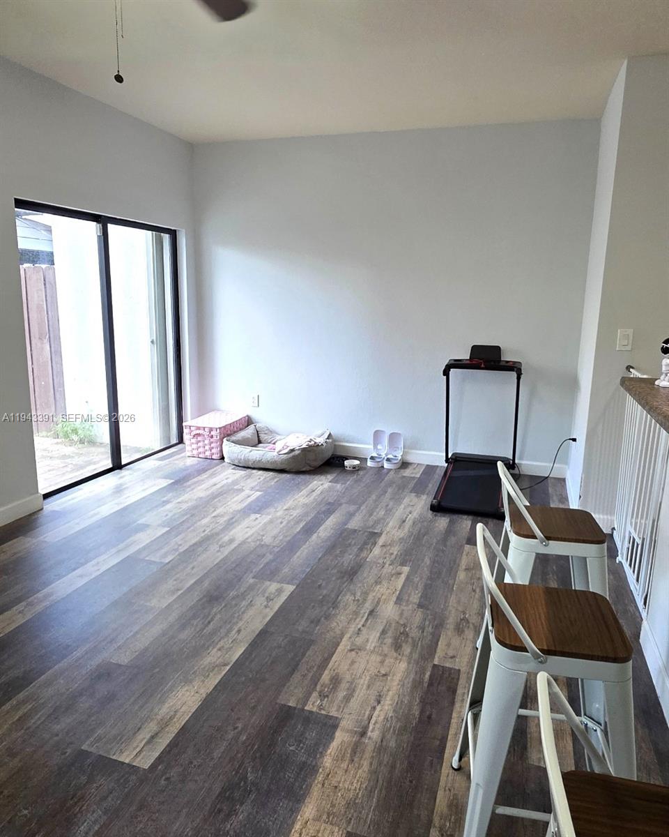 3203 Southeast 7th Street Homestead, FL 33033 - Photo 17 of 44 a bedroom with a bed and a window