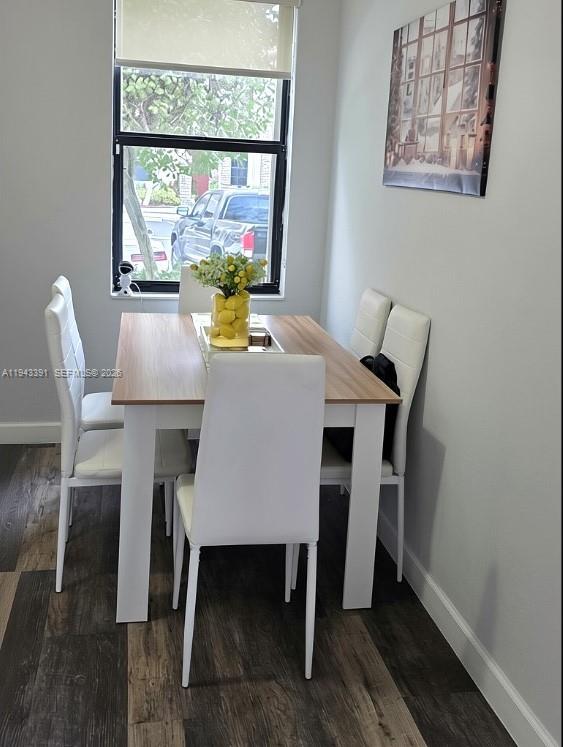 3203 Southeast 7th Street Homestead, FL 33033 - Photo 18 of 44 a dining room with furniture and window