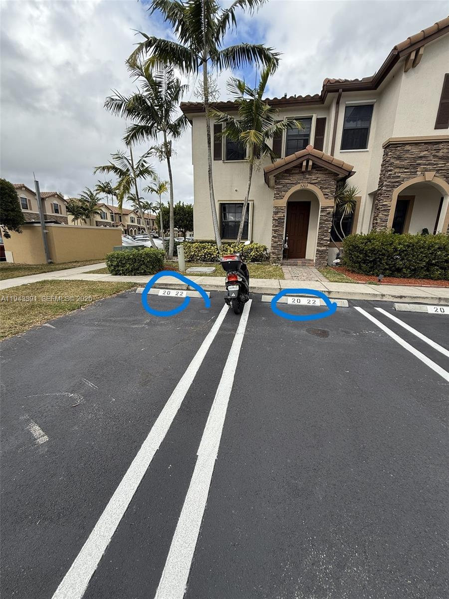 3203 Southeast 7th Street Homestead, FL 33033 - Photo 5 of 44 a view of a house with swimming pool and sitting area