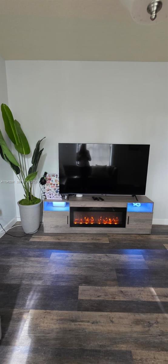 3203 Southeast 7th Street Homestead, FL 33033 - Photo 8 of 44 a living room with furniture and a potted plant