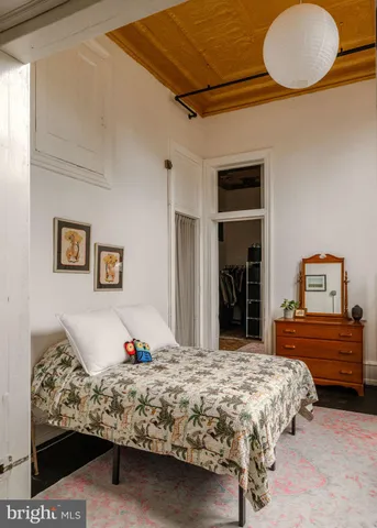 a living room with lots of furniture and a fireplace