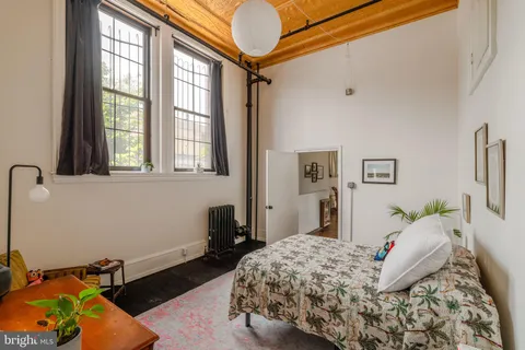 a view of a patio with table and chairs