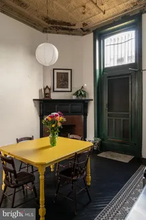 a view of a terrace with sitting area