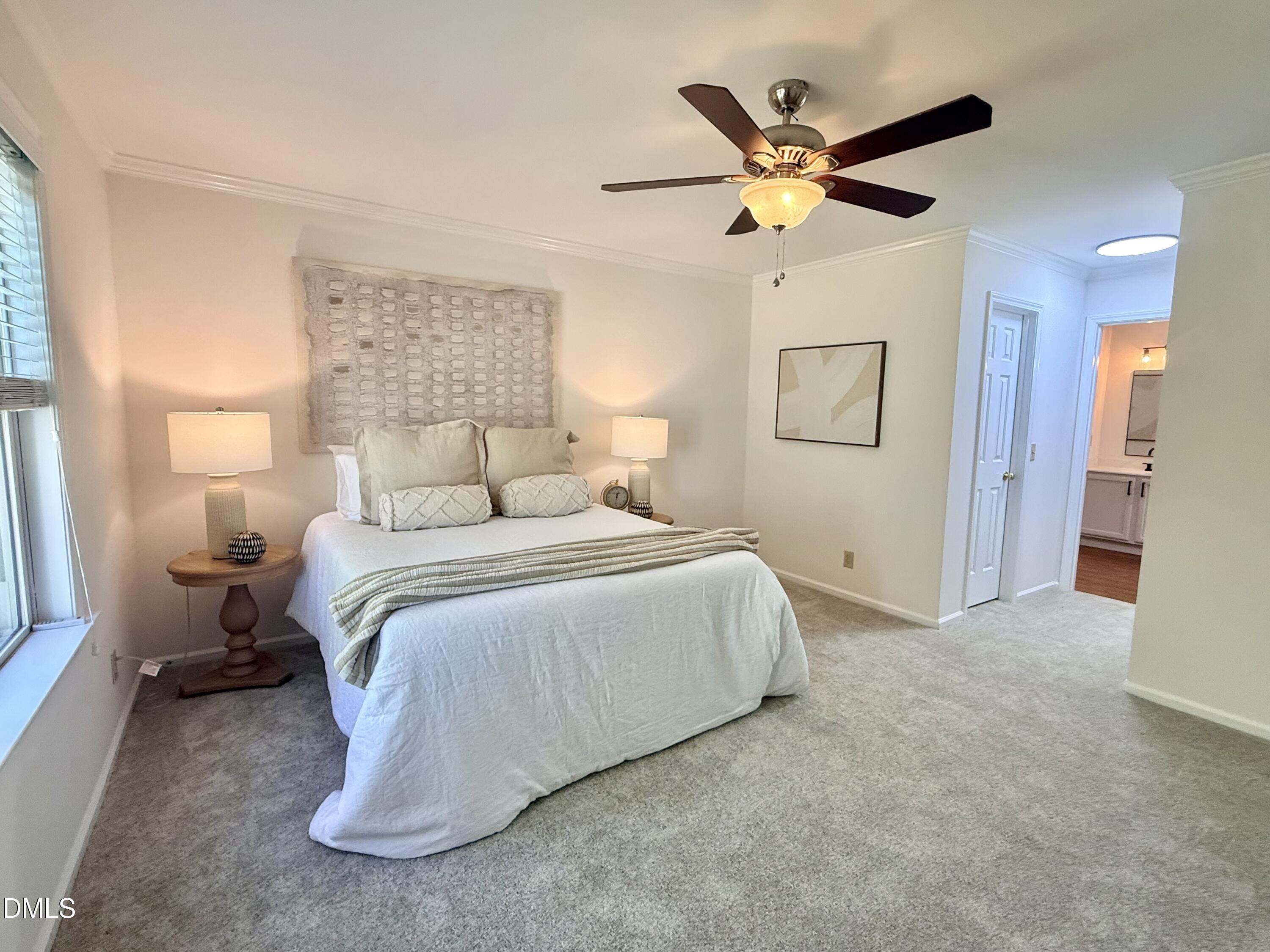 2429 Halifax Road Roxboro, NC 27573 - Photo 25 of 54 a bedroom with a bed and window