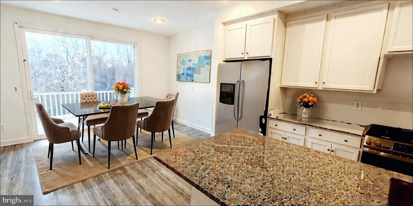 5053 Bigleaf Road Fredericksburg, VA 22407 - Photo 7 of 21 Bright and airy modern kitchen space.