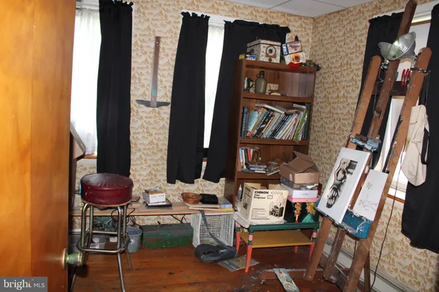 a view of balcony and livingroom with furniture