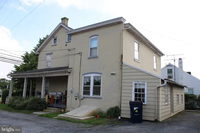 a front view of a house with garage