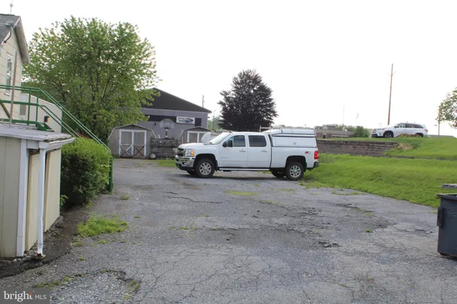 a bus parked in front of a house