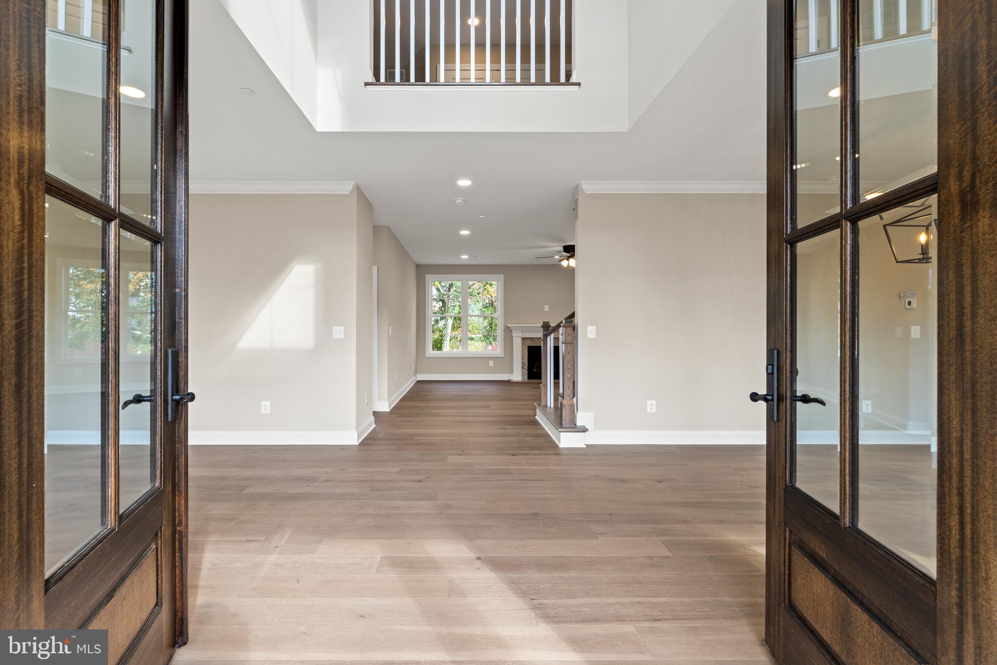 Stem Rd Union Bridge Union Bridge, MD 21791 - Photo 8 of 72 a view of a hallway with wooden floor and a living room