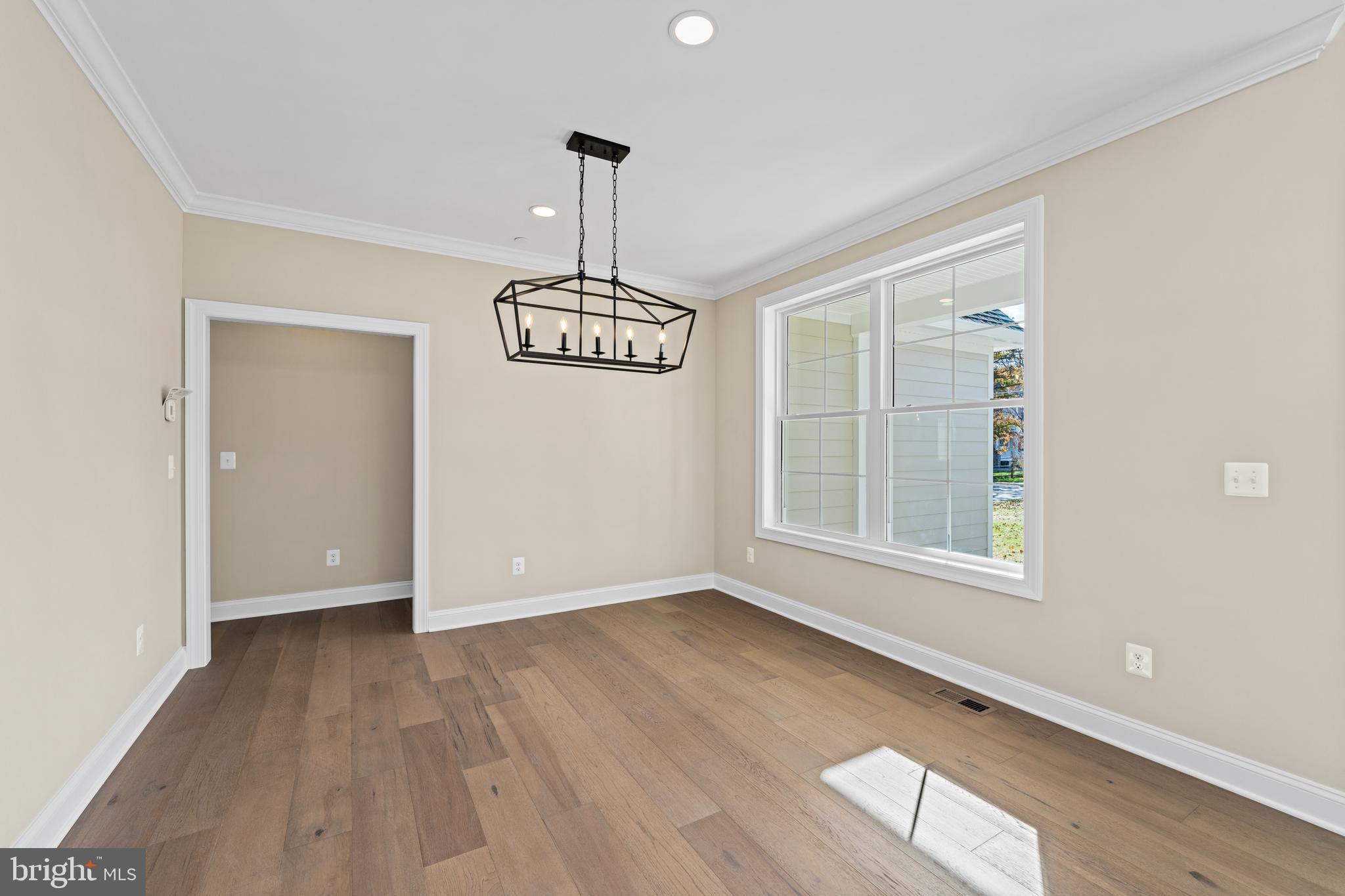 Stem Rd Union Bridge Union Bridge, MD 21791 - Photo 11 of 72 a view of an empty room with window and wooden floor