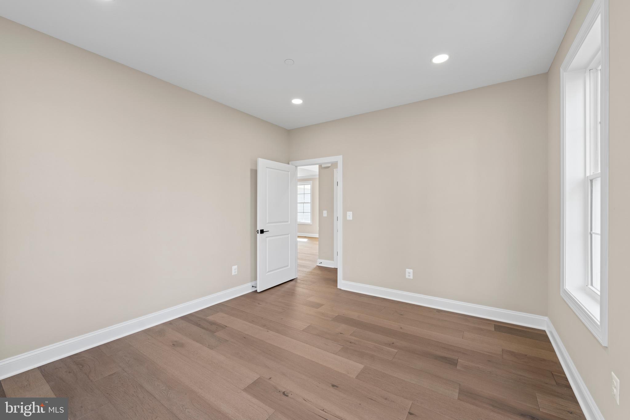 Stem Rd Union Bridge Union Bridge, MD 21791 - Photo 21 of 72 a view of an empty room with wooden floor and a window